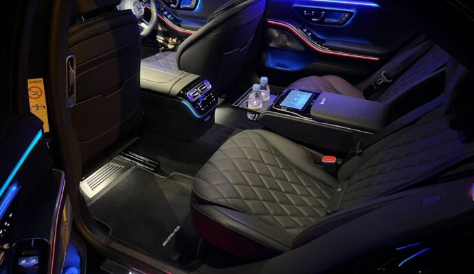 Mercedes S-Class luxury interior with quilted leather seats and ambient lighting